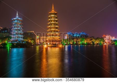 Guilin, China - May 9, 2010: Riyue Shuangta Cultural Park. Wide Shot On The Twin Pagodas In Shanhu L