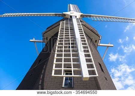 Osaka, Japan - December 12, 2019: Tsurumi Ryokuchi Park Windmill. Close Up, Low Angle View