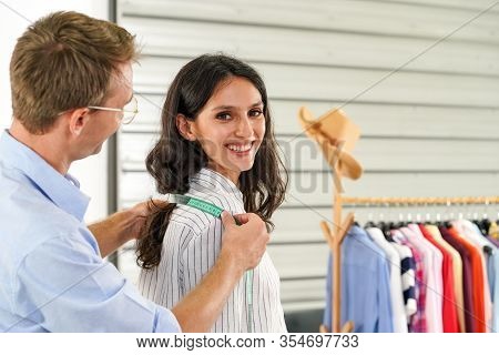 Fashion Designer Room, Man And Woman Working In Home Base Cloth Design Business. A Good Men's Tailor