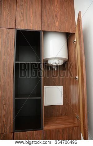 House Hot Water Boiler Hidden In The Bathroom Wardrope With Surface Mounted Electric Meter Box