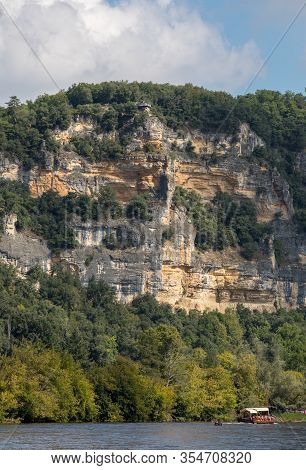 La Roque-gageac, Dordogne, France - September 7, 2018: Canoeing And Tourist Boat, In French Called G