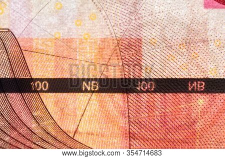 Plastic Security Strip Inside 100 Nok Banknote. Security Strip On Norwegian Krone Banknote Created T