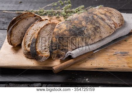 Fresh Italian Ciabatta Bread  For Leaven With Herbs,  On Wooden Background, Top View, Copy Space.