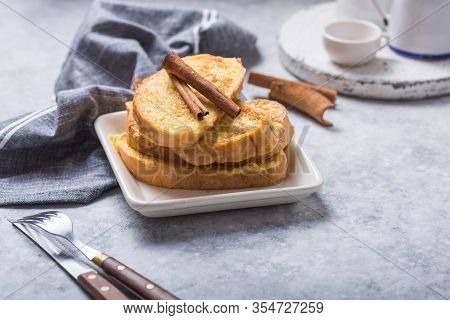 Traditional Homemade Spanish Torrijas On Wooden Background. Easter Dessert. Spanish Torrijas