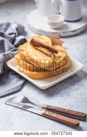 Traditional Homemade Spanish Torrijas On Wooden Background. Easter Dessert.