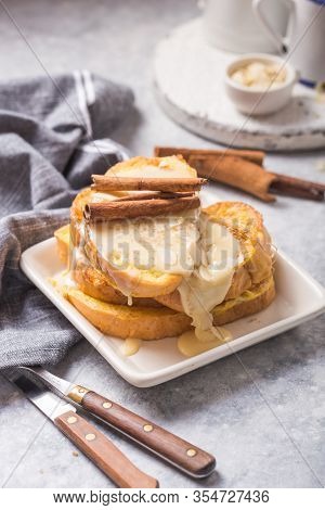Traditional Homemade Spanish Torrijas On Wooden Background. Easter Dessert. Spanish Torrijas