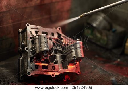 Using Sandblast Gun To Clean Dirty Car Engine Part, Horizontal Close Up Shot, Copy Space