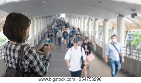 Rare View Of Asian Woma Ncheck Update Of Virus Covid-19 News On Social Media In Smart Mobile Phone W