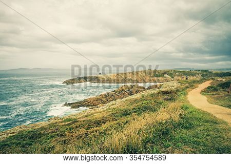 A Coruna, Spain - July 25, 2019: Landscape Of The Atlantic Ocean With The Sculpture Of The Caracola 