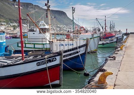 Kalk Bay Harbour, Cape Town, South Africa - 16 May 2019 : Traditional Wooden Fishing Boats Are Moore