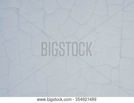 Beige Texture With Many Cracks And Scratches. Crackle.
