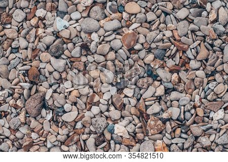 Abstract Nature Sea Pebbles Background. Beige Vintage Color. Different Forms Multicolor Pebbles (gre