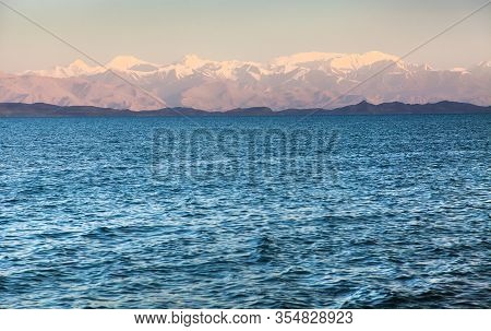 Karakul Lake And Pamir Range In Tajikistan. Landscape Around Pamir Highway M41 International Road