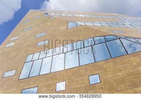 Groningen, Netherlands - March 07, 2020: Modern Facade Of The Groninger Forum In The Netherlands