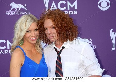 LOS ANGELES - APR 1:  Amanda Hogan, Carrot Top at the 47th Annual Academy Of Country Music Awards at the MGM Garden Arena on April 1, 2012 in Las Vegas, NV