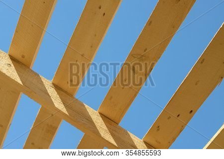 Wood Board Assembled On Construction Site. New Frame Structure Of Building. Scaffolding Framework Ma