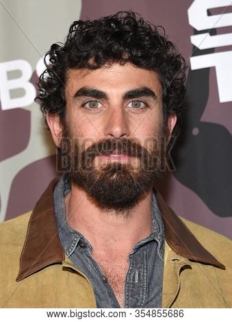 LOS ANGELES - FEB 25:  Justin Melnick arrives for ââSeal Teamâ Winter Premiere on February 25, 2020 in Hollywood, CA                