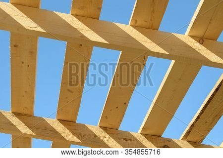 Wood Board Assembled On Construction Site. New Frame Structure Of Building. Scaffolding Framework Ma