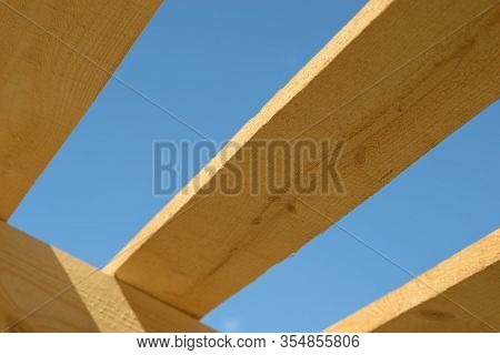 Wood Board Assembled On Construction Site. New Frame Structure Of Building. Scaffolding Framework Ma