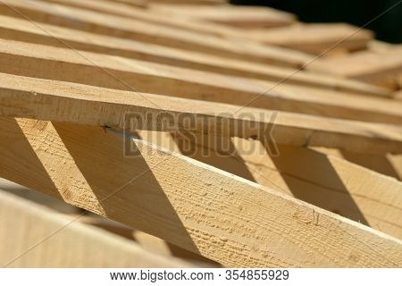 Wood Board Assembled On Construction Site. New Frame Structure Of Building. Scaffolding Framework Ma
