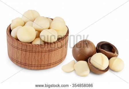 Macadamia Nuts In Wooden Bowl Isolated On White Background With Clipping Path And Full Depth Of Fiel