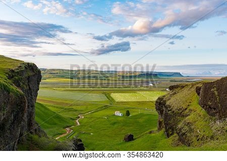View Over The Agricultural Landscape Surrounding The Town Of Kirkjubaejarklaustur In South Iceland