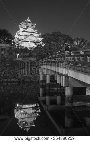 Night Scene Of Historical Landmark Oaska Castle In Japan
