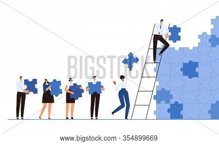 The Business Team Together Collects A Wall Of Puzzles. The Concept Of Teamwork, Cooperation And Part