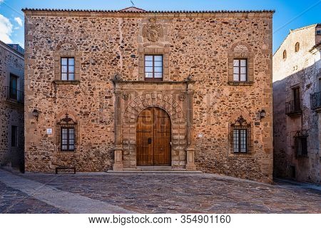 Episcopal Palace In Caceres, Extremadura, Spain. Located In Plaza Santa Maria, Main Facade, Renaissa