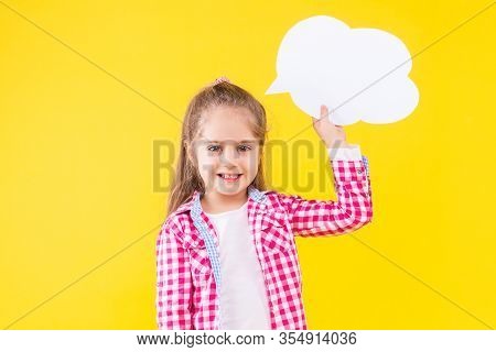 Pretty Fair Haired Girl In Pink Checkered Shirt Is Holding White Paper Decorative Thinking Cloud. Cu