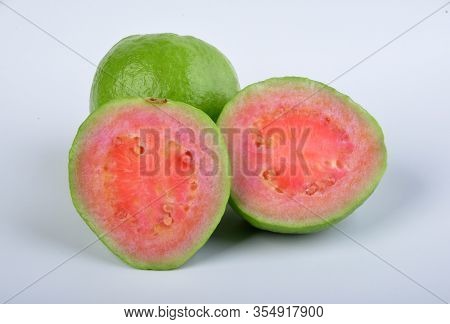 Group Of Red Guava Fruit In White Background