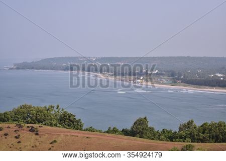 Ariel View Of The Waves In The Ocean Near Chapora Fort