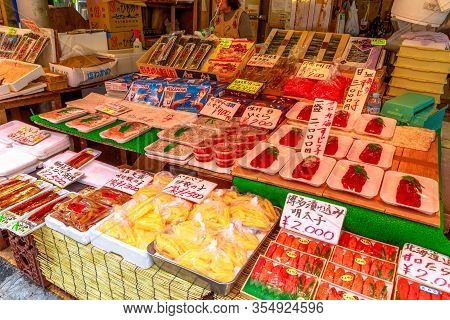 Tokyo, Japan - April 18, 2017: Stall Selling Sushi, Sashimi, Fresh Fish And Japanese Food At Ameya-y