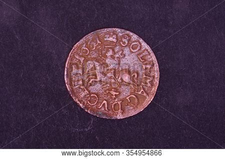Ancient Grand Duchy Of Lithuania Coin Shilling Isolated On The Black Background