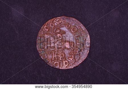 Ancient Grand Duchy Of Lithuania Coin Shilling Isolated On The Black Background