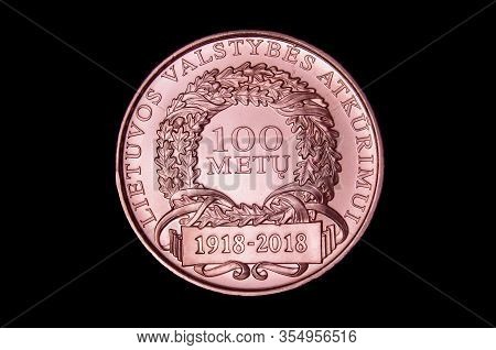 L.50 italian coin isolated on the dark background