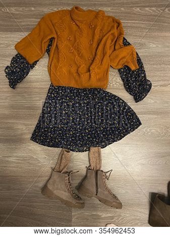 Clothes Are Lying On The Floor, As If It Were Dressed By A Man. Options For Dresses For A Man Or A W