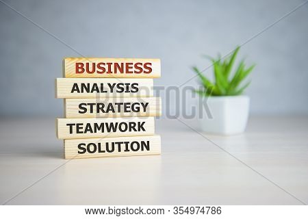 Wooden Blocks With Word Business, Alalysis Strategy Teamword Solution. Business Concept Background