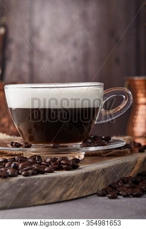 Cappuccino Is An Espresso-based Coffee Drink And Steamed Milk Foam Made From Coffee In A Transparent