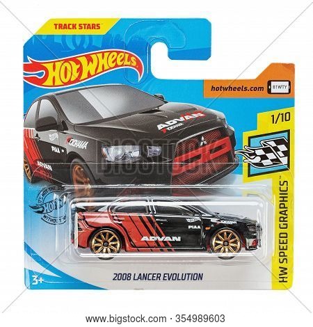 Ukraine, Kiev - March 02. 2020: Mitsubishi Lancer Evolution Car. Hot Wheels. Kids Toys. Machines. Fi