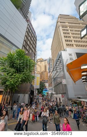Hong Kong, China - 2020: Pedestrians On The Streets, Office And Shopping Centers