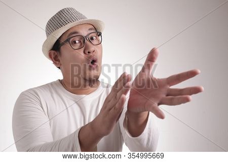 Happy Young Man Clapping Hands