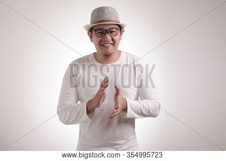 Happy Young Man Clapping Hands