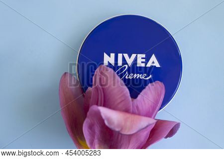 May 4, 2022 Ukraine, Kyiv City Cream Nivea With Flower Tulips