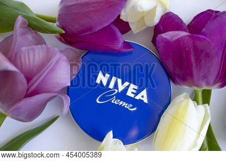 May 4, 2022 Ukraine, Kyiv City Cream Nivea With Flower Tulips