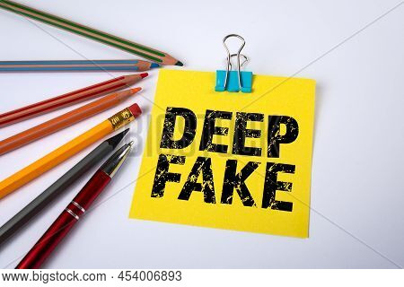 Deep Fake. Sheet Of Paper And Pen On A White Background