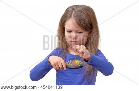 Isolated Caucasian Little Girl Of 5-6 Years With Long Hair Pulling Out Hair From Brush On White Back