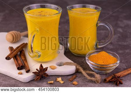 Healthy Vegan Golden Milk Latte Drink. Indian Garam Badami Dud .