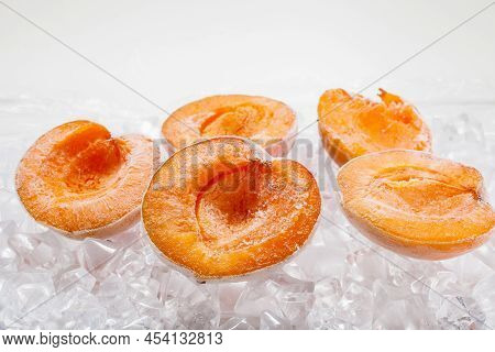 Fresh Berries Apricots On Ice Quick Freezing