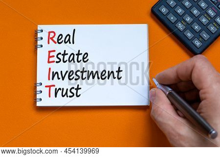 Reit Real Estate Investment Trust Symbol. Concept Words Reit Real Estate Investment Trust On The Not